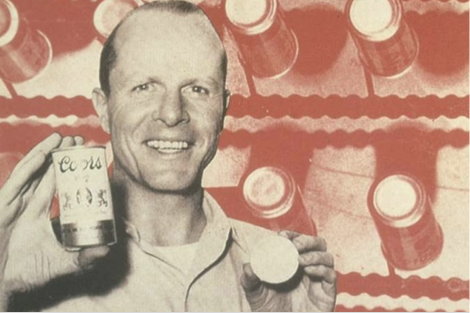 Bill Coors holding two beer cans